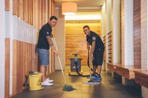CMOS team members cleaning a site